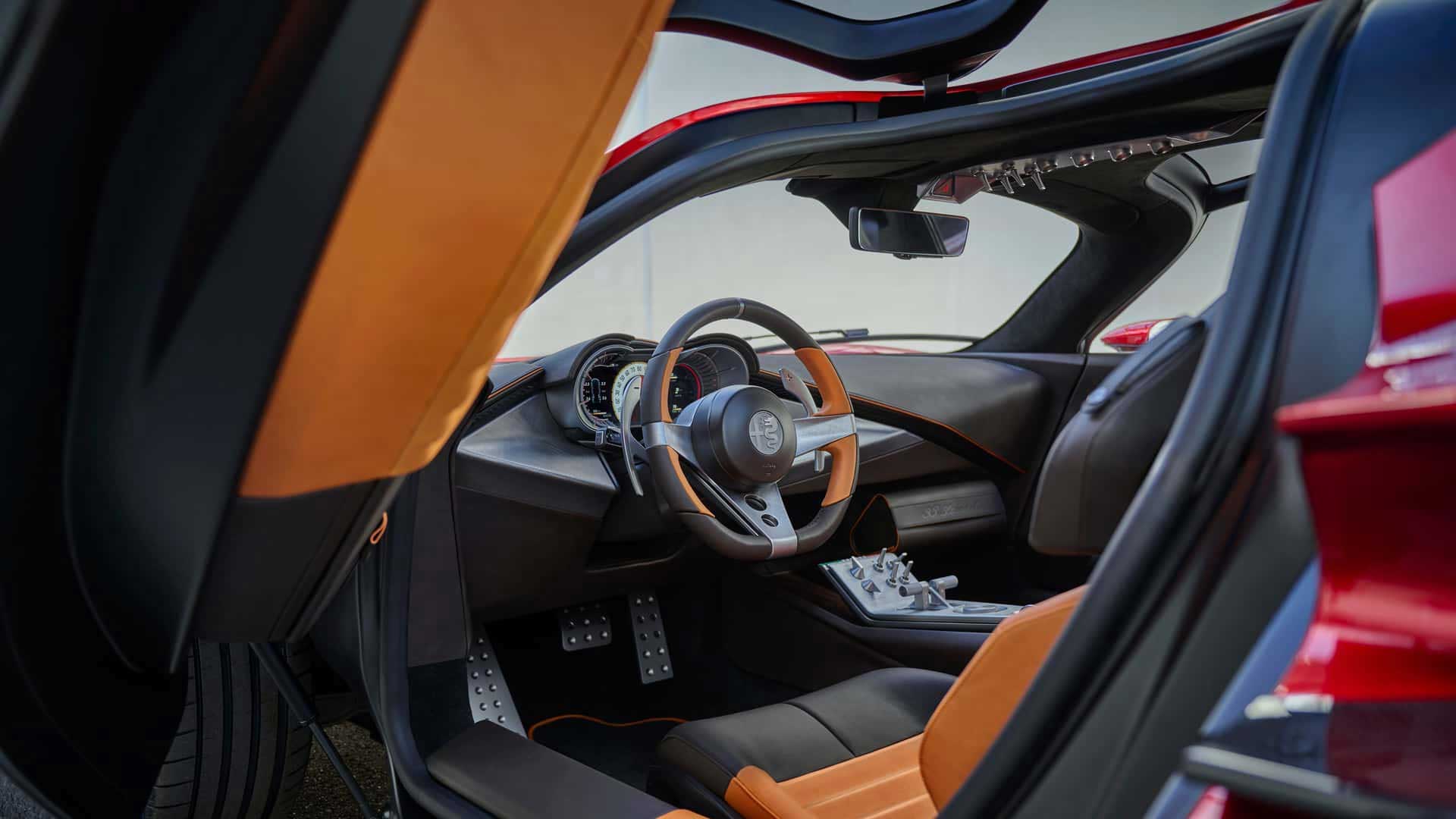 Alfa Romeo 33 Stradale interior Showing Alfa Romeo 33 Stradale Interior from driver door view